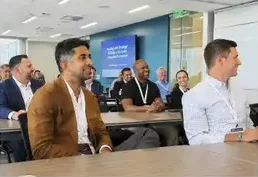 A roundtable discussion at a workshop table